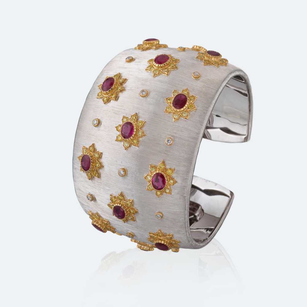 White and yellow gold with rubies, diamonds and fancy yellow diamonds