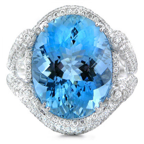 This is a handcrafted 18k white gold aquamarine and diamond ring. 