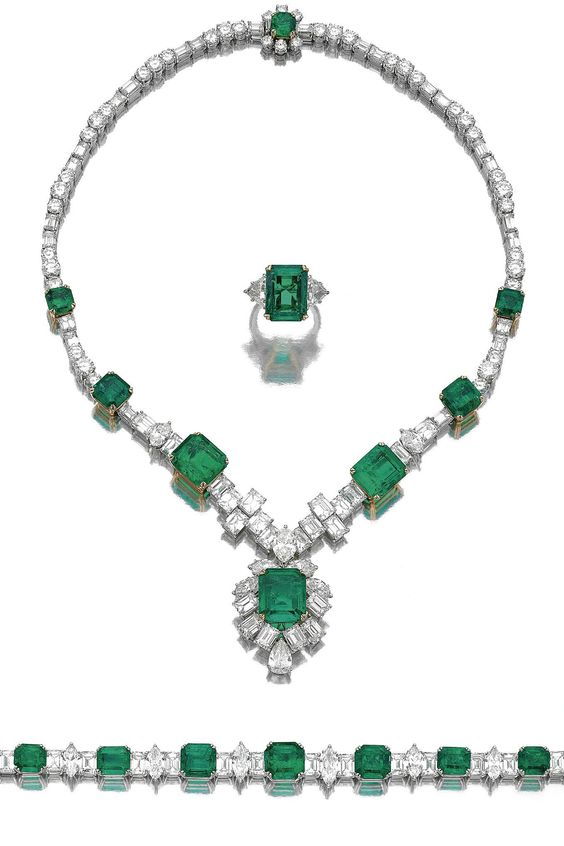 IMPORTANT EMERALD AND DIAMOND PARURE. Comprising: a necklace, a bracelet and a ring, set with square and rectangular step-cut emeralds, marquise- and pear-shaped, brilliant- and step-cut diamonds. 