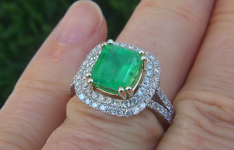 Certified 2.62 Carat Natural Colombian Emerald & Diamond Estate Ring. This rare and unique ring boasts a Colombian Emerald with 100% natural vivid green color. The emerald weighs in at an impressive 1.84 carats (exact carat weight) and features SI clarity with moderate visible inclusions. This world class gemstone is set in a master crafted solid 14k white & yellow gold setting and features 0.78 carats of SI1-I1 clarity colorless to near colorless G-H color round brilliant natural accent diamonds