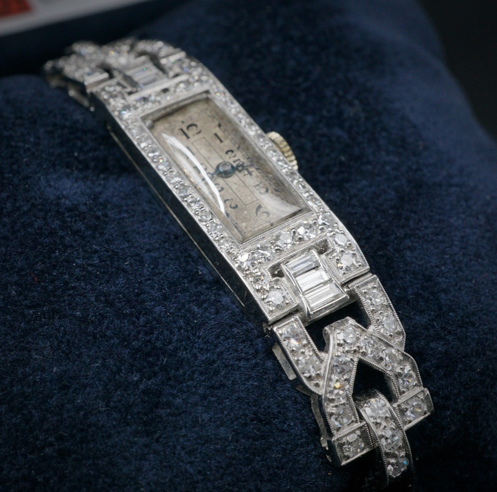Watch: Edwardian era Rado brand 17 jewel mechanical movement watch with black cord band, fastening with a fold-over locking clasp | 68 diamonds | 1.32 carats | Appraisal: $19,950