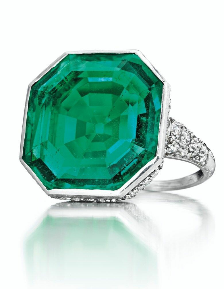 A Emerald and Diamond Ring by Cartier