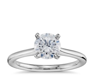 1 Carat Preset Petite Solitaire Engagement Ring in Platinum     This classic engagement ring features a preset 1-carat round near-colorless center diamond, set in an enduring platinum solitaire setting. Each ring will be accompanied by a GIA grading report and a complimentary appraisal. 