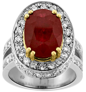 This amazing ruby and diamond ring will stun your senses with its impressive demeanor. The center of this fine work of art features a gorgeous, genuine oval cut ruby with a massive weight of 7.02 carats. This exceptional ruby gleams with an intense and vibrant color that will demand admiration. Surrounding the ruby on the bezel, and on the side of the bezel, as well as down the shank are glittering pave set round cut diamonds. These diamonds have a total combined weight of 1.50 carats and ranges in clarity from Vs2-Si1 with a color grade ranging from H-I. This imposing ring is made of 14kt. white and yellow gold with a total gold weight of 13.20 grams.