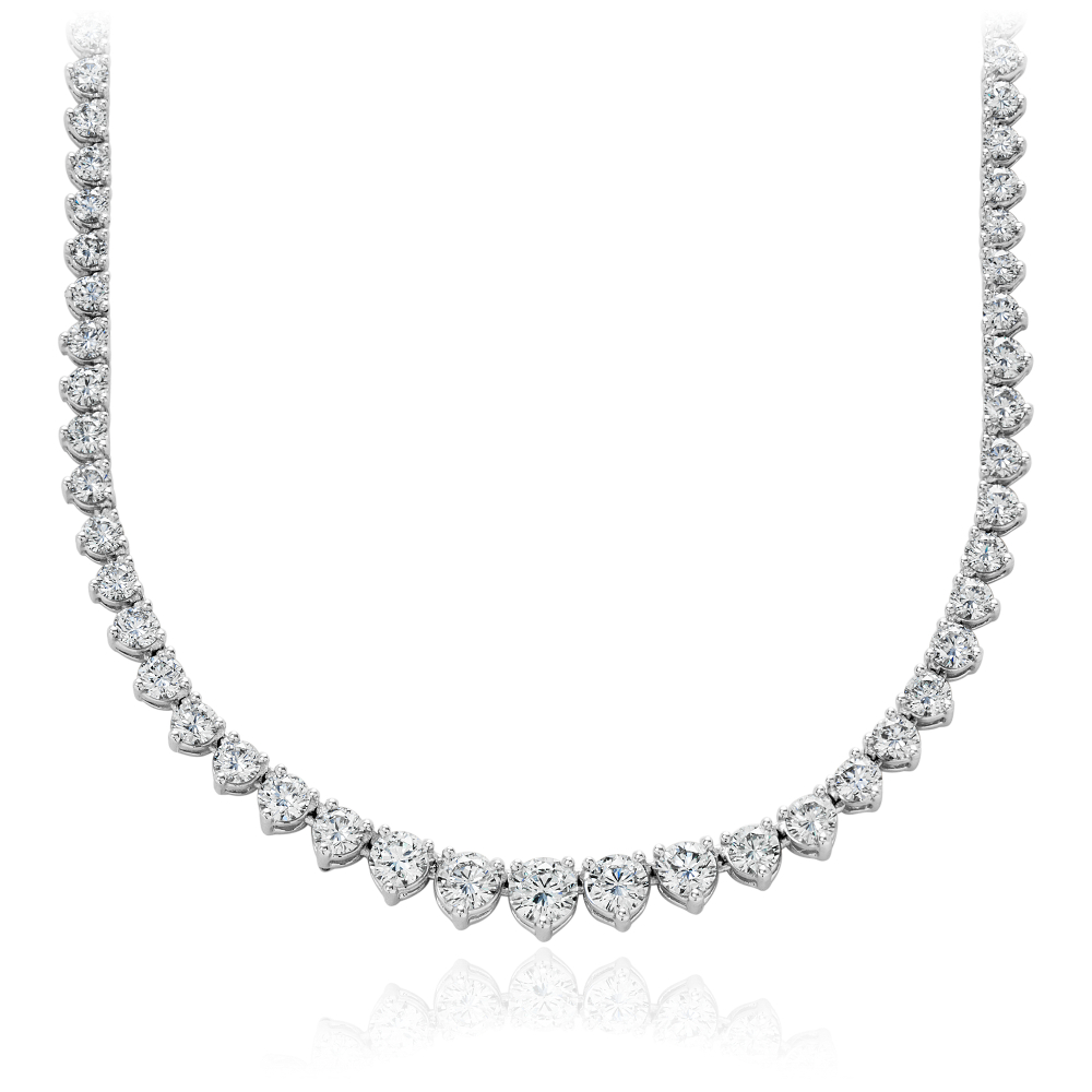 Eternity Diamond Necklace in 18k White Gold (10 ct. tw.) Exceptional radiance, this diamond necklace features 115 graduated brilliant cut round diamonds hand-set in 18k white gold for maximum fire. 10 carat total diamond weight. 
