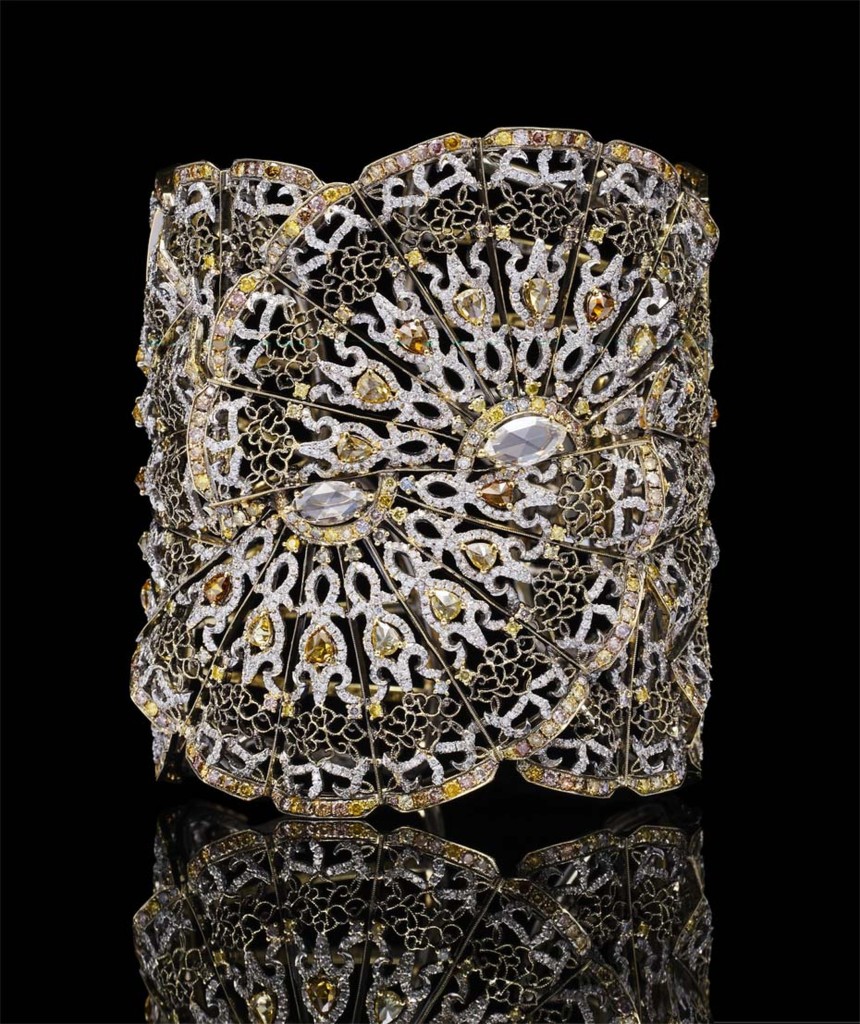 Bao Bao Wan Fan bangle in yellow gold, set with yellow, cognac and pink diamonds, white diamonds and two marquise-shaped diamonds