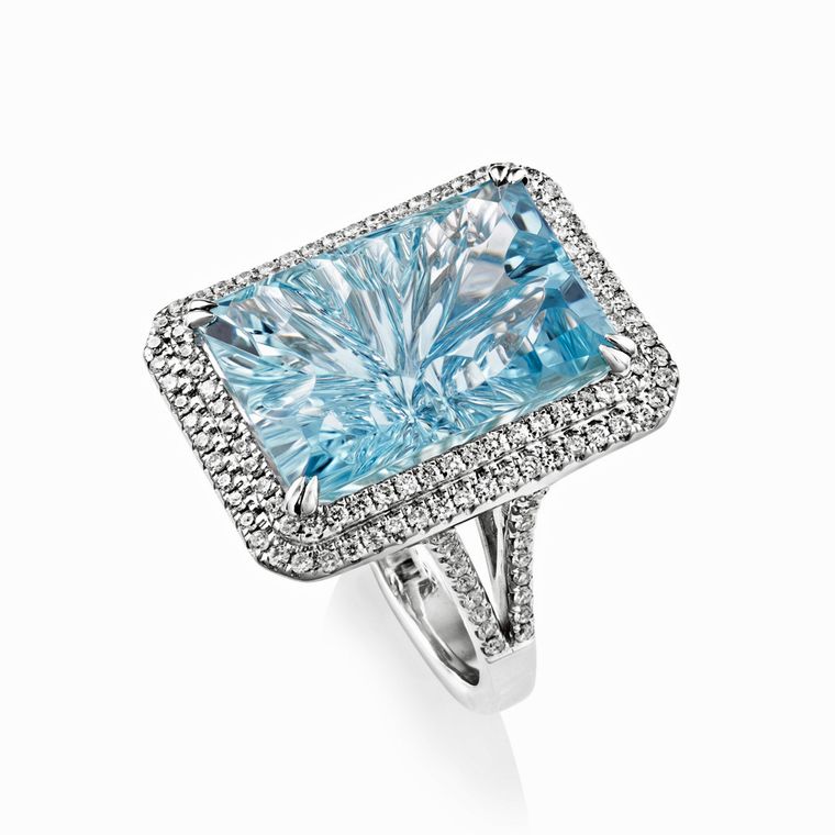 White gold ring by Sheldon Bloomfield set with a carved aquamarine and diamonds