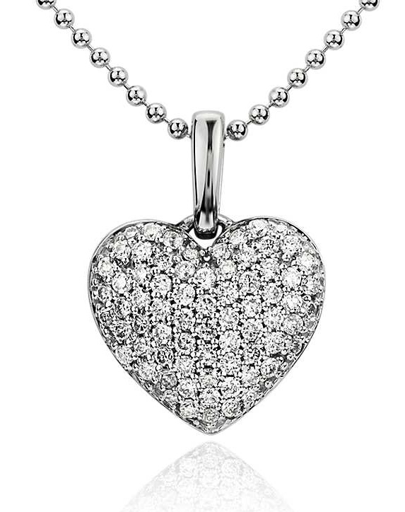 Diamond Heart Pendant in 14k White Gold (1/4 ct. tw.) A timeless design makes this heart pendant enduring, and features 71 pavé-set diamonds with a 14k white gold bead chain necklace.