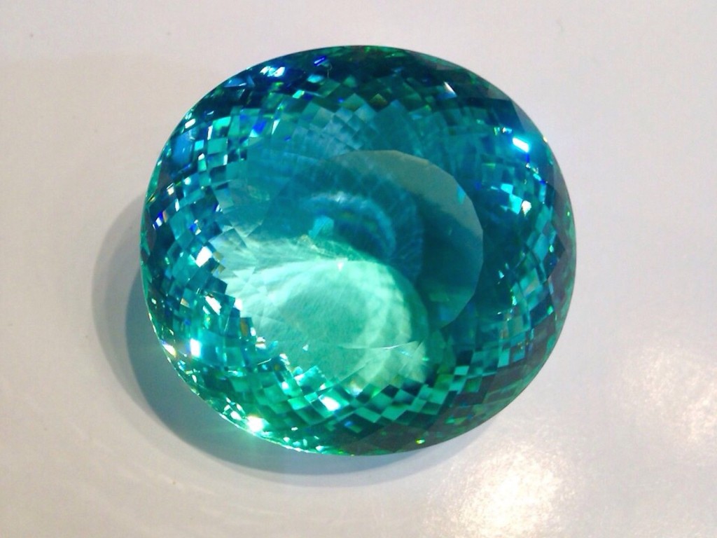 GIA Certified copper bearing Paraiba Tourmaline and the largest known specimen in the world at 267.25 carats. GIA Certified and stunning. Near flawless example and coloring is incredible.