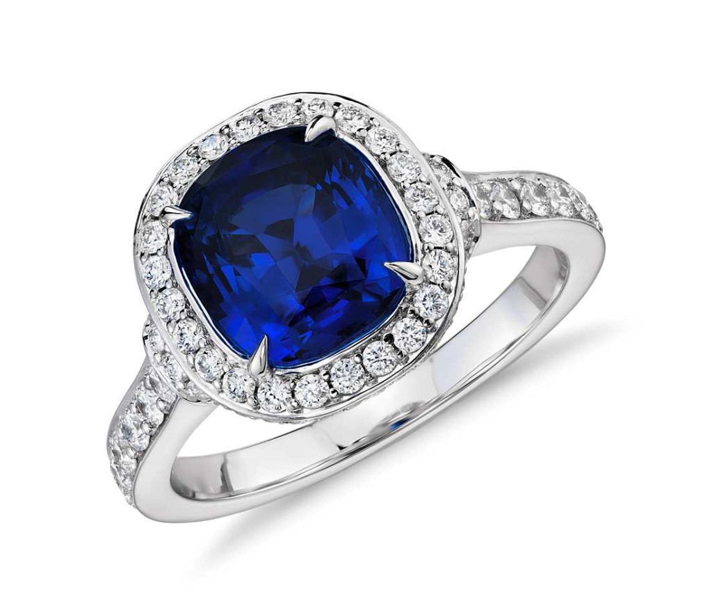 Cushion-Cut Sapphire and Diamond Halo Ring in 18k White Gold (2.58 ct center) Distinctly glamorous, this sapphire gemstone ring showcases a 2.58 carat cushion-cut sapphire and a brilliant halo of pavé-set round diamonds framed in enduring 18k white gold.