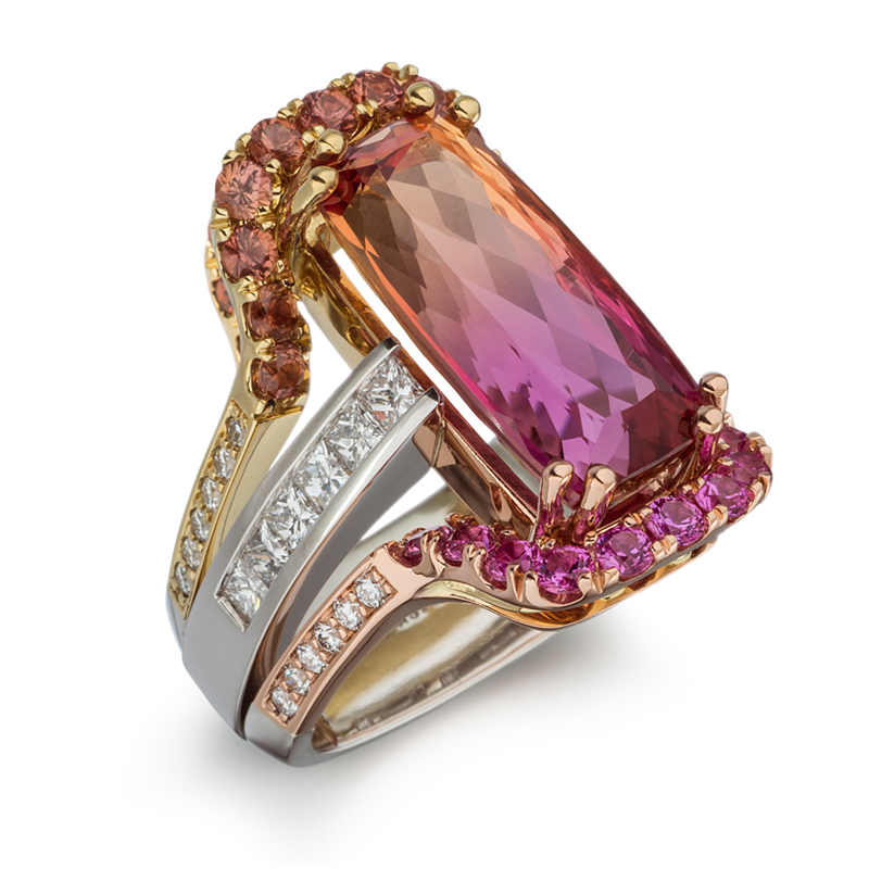 One-of-a-kind 10.65 ct Bi-Color Precious Topaz embellished with Natural Umba Sapphire, Pink Sapphire, and Diamond. Set in 18k Rose, 18k Yellow, and Platinum.