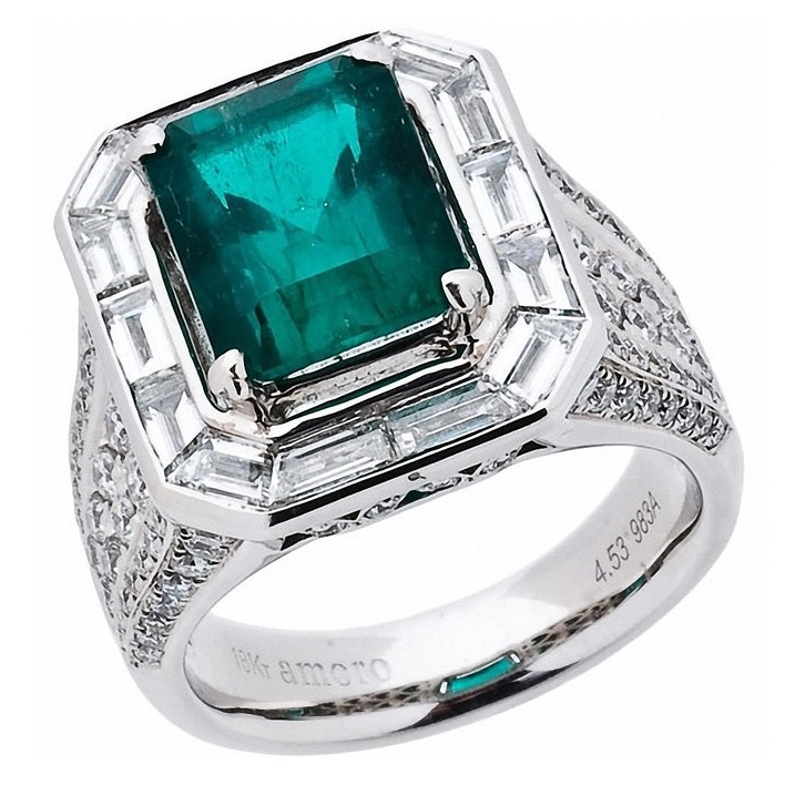 Baguette Diamonds surround this gorgeous, emerald cut green Colombian Emerald weighing over 4.5 carats