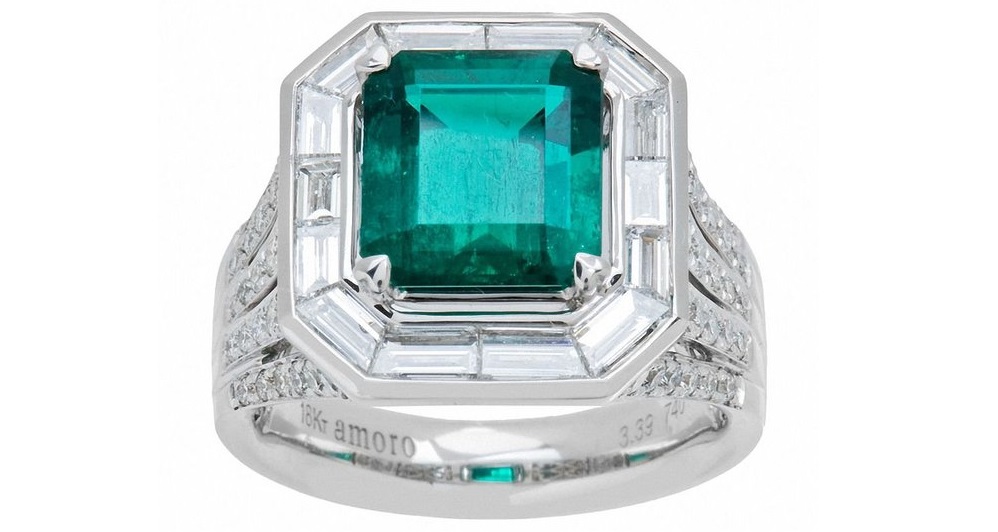 A Vivid Green Colombian Emerald and Diamond Ring in 18kt white gold
