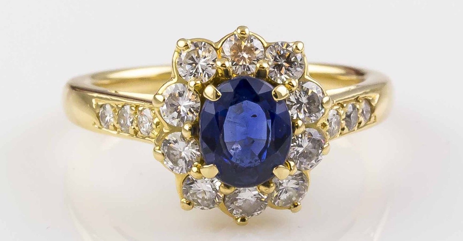 Charming and elegant 18K yellow gold, sapphire and diamond cocktail ring by Cartier. 
