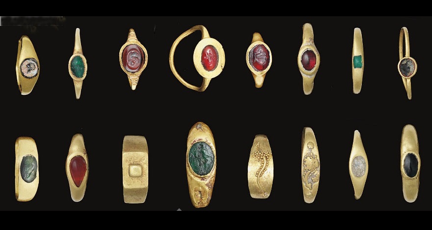 16 Roman gold rings, c. 1st century B.C.-3rd century A.D., set with emeralds, garnet, carnelian and jasper (some engraved) 