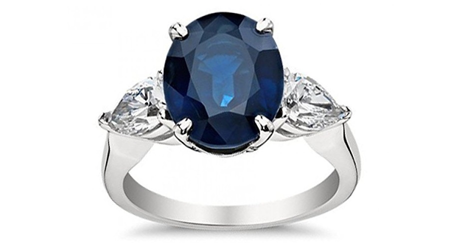 9.33 ct Oval Shape Sapphire With Pear Shape Diamond Anniversary Ring in 14 kt White Gold