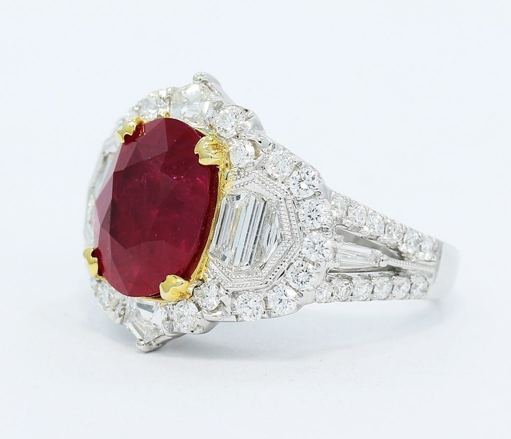 A Gorgeous 5.50 Ct Oval Ruby and Mixed Cut Diamond Ring 18K White Gold
