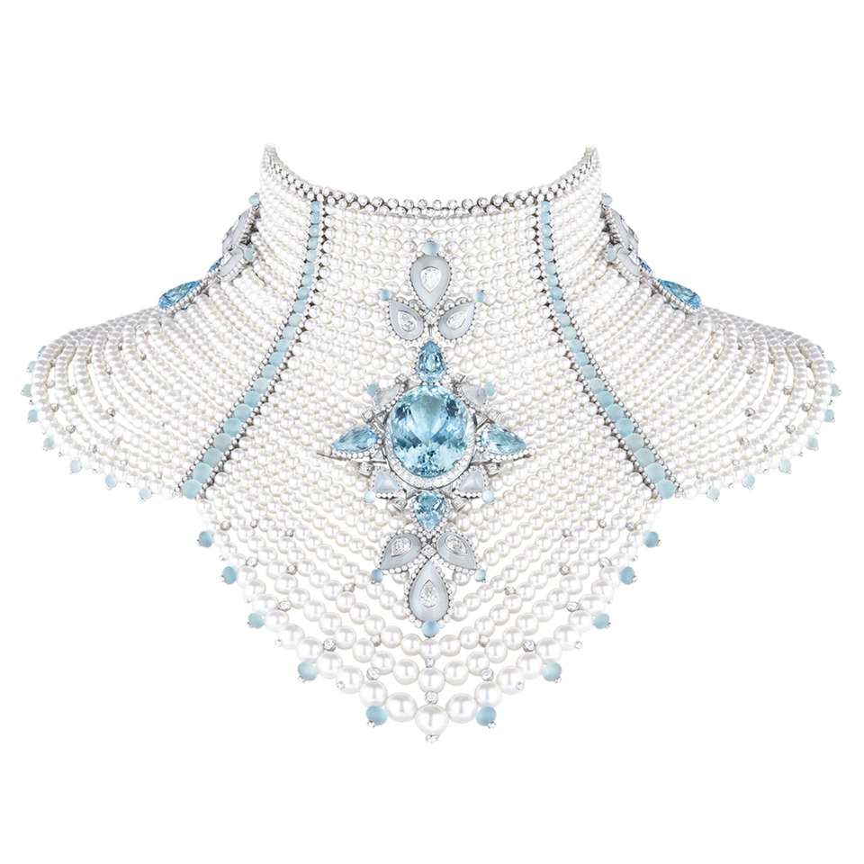 BAÏKAL Necklace set with a 78,33 ct Santa Maria oval aquamarine, moonstones and cultured pearls, paved with diamonds and aquamarines, on white gold.