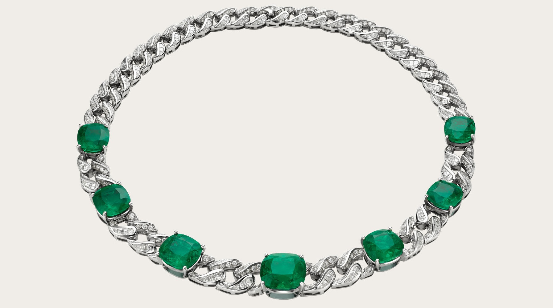 High Jewellry necklace in platinum with 7 cushion shaped emerald (56.4 ct), fancy shaped step cut diamonds and pave diamonds (19.23 ct).
