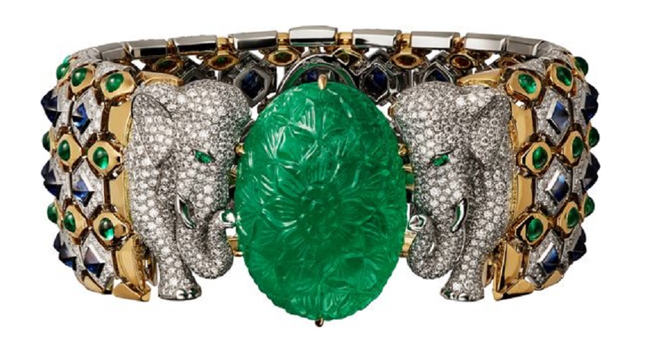 Bracelet - platinum, yellow gold, one 79.50-carat carved emerald from Colombia, cabochon-cut emeralds, cabochon-cut sapphires, emerald eyes, brilliant-cut diamonds by Cartier.