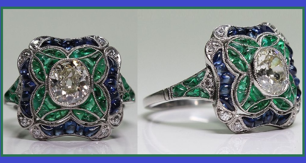 An Art Deco platinum, diamond, sapphire and emerald ring, 1920-35. 