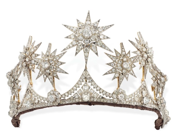 A Victorian diamond star parure, circa 1870. Comprising a tiara, the front set with six graduated old-cut diamond flowerhead clusters, each interspersed by an old-cut diamond collet and similarly-set graduated triangular intersections, surmounted by nine detachable star motifs, mounted in silver and gold. 30 cm. Sold for £317,000 on 13 June 2017 at Christie’s in London