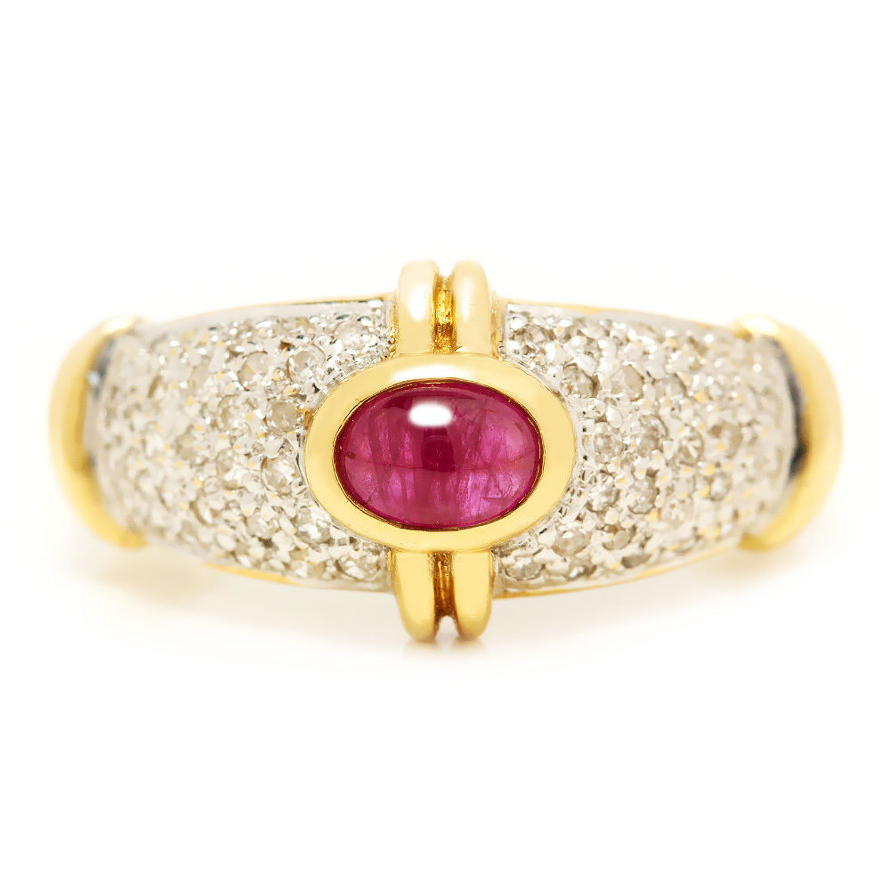 Vintage Cabochon Ruby Ring

with Diamonds in 14kt Two Tone Gold .75ctw